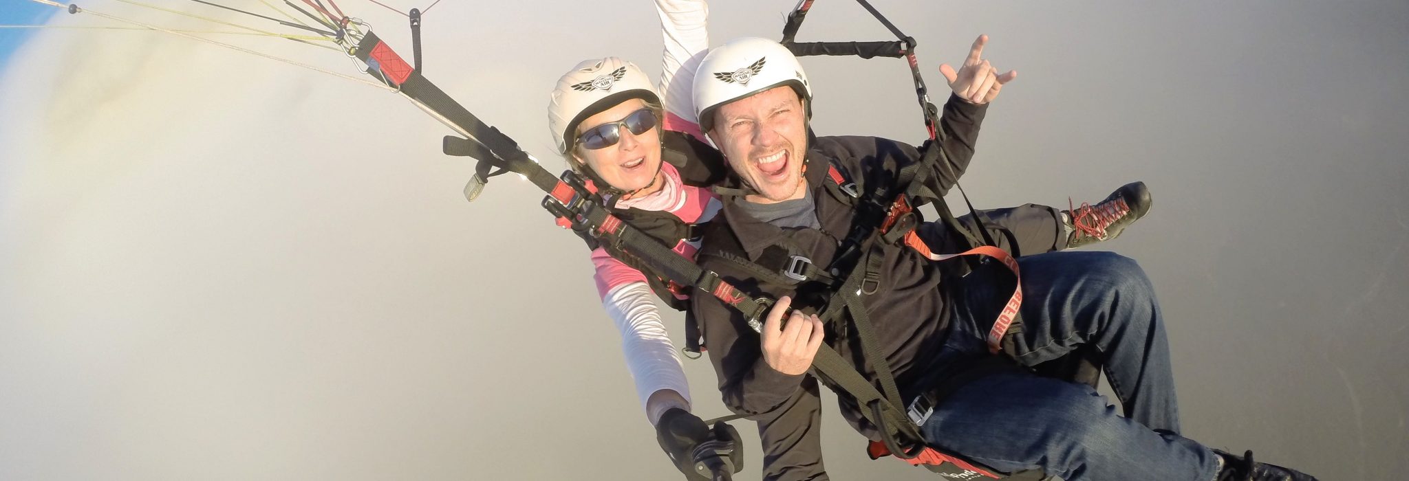 Above the clouds. Tandem Paragliding